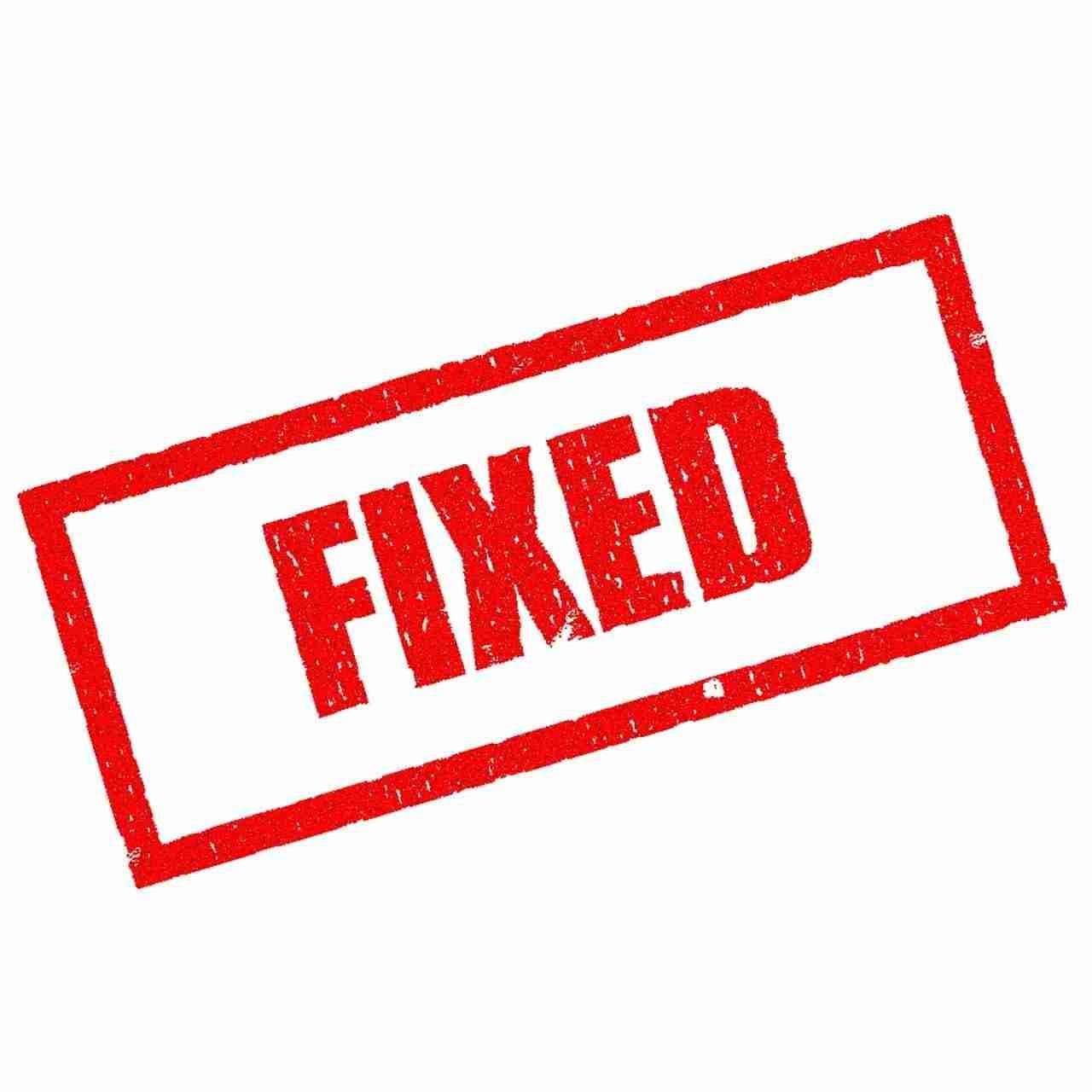 Red "fixed" stamp overlay on a plain background, signaling the completion of a correction or repair.