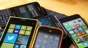 refurbished mobile phones cheaper prices pile of mobile phones