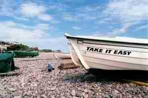 Easy To Get Mobile Phones take it easy boat on beach